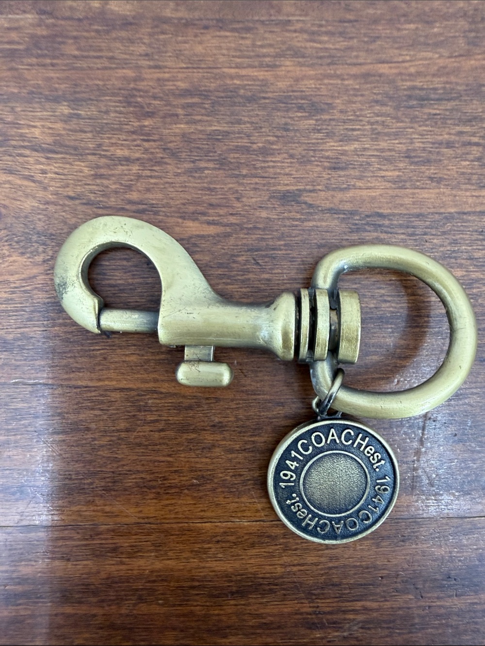 COACH Antique Brass Key Clip with Round Logo Charm - Brass - Picture 3 of 5